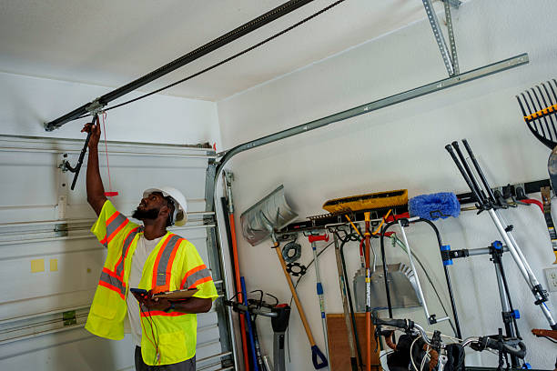Professional Garage Door technician working in Highpoint, OH